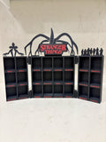 Expositor Stranger Things con iluminación